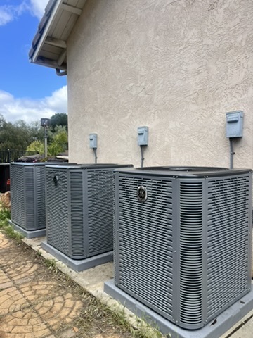 AIM Mechanical technician installing a new HVAC system in San Diego